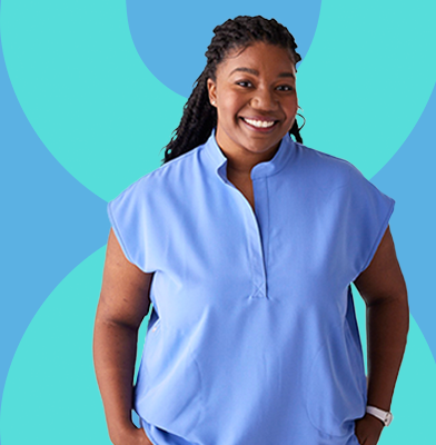 A smiling nurse looking helpful