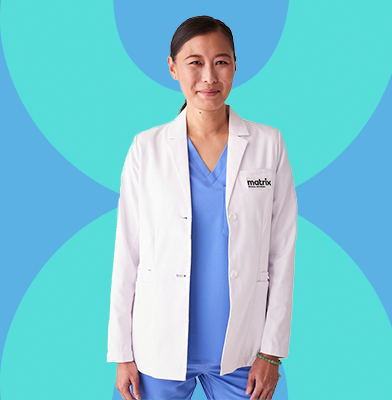 A smiling nurse looking helpful